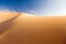 Golden dune and blue sky 1