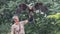 Golden eagle with dark brown, with lighter golden-brown plumage on the napes on the falconer hand. Birds for falconry