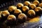 golden edible glitter sprinkled on dark chocolate truffles