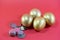 Golden eggs with coins in concept investment or Easter