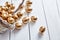 Golden eggs spilled out of wicker basket on white  table