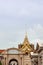 Golden facade and roof of Bangkok Grand Palace `Chakri Maha Prasat` throne hall