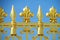 Golden fence with needles ornaments