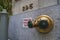 Golden fire hydrant sprinkler connection in a wall in New York City