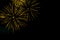 Golden fireworks border on the black sky background with copyspace