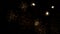 golden fireworks in the night sky - transparent black background - seamless loop - 25 fps