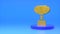 Golden first place cup sign on a dark blue podium on a blue background. The concept of success, luck, victory, opportunity, growth