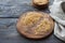 Golden flax seeds on wooden table. trash removal process. healthy vegan superfood