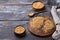 Golden flax seeds on wooden table. trash removal process. healthy vegan superfood