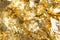 Golden foil pieces as shiny decoration texture element