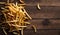 Golden French Fries Piled on Rustic Wooden Table, Copy Space