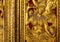 Golden fresco in a Buddhist temple
