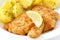 Golden fried schnitzel with boiled potatoes