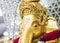 Golden Ganesh Elephant god statue in hinduism mythology with g