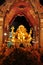 Golden Ganesha Shrine and sacred marigold flower in the night , Hindu shrine in Bangkok landmark