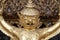 Golden Garuda statue stand around , the bronze symbol of Thai government, giant ancient gold eagle with crown sculpture