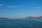 The Golden Gate Bridge in San Francisco with beautiful azure ocean and clouds in background