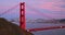 Golden Gate bridge with San Francisco skyline at sunset California