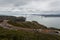 Golden Gate Bridge seen in the distance from cliffs