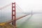 Golden Gate Bridge, the symbol of San Francisco city on a foggy day - California - USA