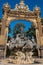 Golden gate to the Place Stanislas square and Neptune Fountain, Nancy, Lorraine, France. A UNESCO World Heritage Site