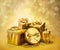 Golden gift boxes as a symbol of wishes and celebration. Golden blurred bokeh background