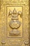 Golden gilded asian temple door ornamental fragment