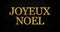 Golden glitter with the french words for merry christmas - joyeux noel on black chalkboard background