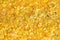 Golden glitter or yellow sequins background
