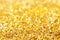 Golden glittering shiny textured background