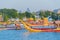 The Golden Grand Palace with the royal barge procession for The Thai King on Chao Phraya River near Downtown of Bangkok City,