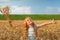 Golden hair girl in wheat field