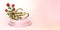 Golden Happy Valentine`s Day inscription in a heart standing on a circular pedestal in pink