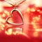 Golden heart on blazing red background