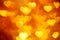 Golden heart bokeh background photo, abstract holiday backdrop