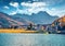 Golden hills around small alpine tovn - Silvaplana. Picturesdque morning view of Lake Champfer, Upper Engadine in the Swiss canton