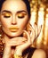 Golden holiday makeup. Fashion art manicure and makeup