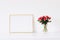 Golden horizontal frame and bouquet of rose flowers on white furniture, luxury home decor and design for mockup creation