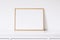 Golden horizontal frame on white furniture, luxury home decor and design for mockup creation