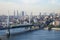 Golden Horn Metro Bridge with old and modern side of Istanbul background