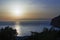 Golden hour sunset in the magical island of Patmos, Greece over a seascape and a horizon in summer time