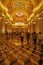 Golden hues of the hallway of a casino in Macau modeled on Italian culture and design