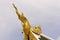 Golden Hussadeeling Statues gable apex with sky