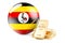 Golden ingots with Ugandan flag. Foreign-exchange reserves of Uganda concept. 3D rendering