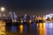 Golden Jubilee Bridges reflecting in the Thames at night