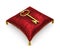 Golden key on royal red velvet pillow isolated on white background 2