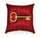 Golden key on royal red velvet pillow isolated on white background 3
