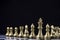 Golden king chess stand in front of others chess pieces. Leadership business teamwork and marketing strategy planing concept
