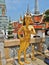 A Golden Kinnara statue at the Temple of the Emerald Buddha, Thailand.