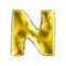 Golden letter N made of inflatable balloon isolated on white background.